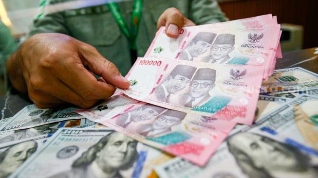 Rupiah Melemah ke Rp18.066 per Dolar AS, Pelaku Pasar Waspadai Sentimen Global